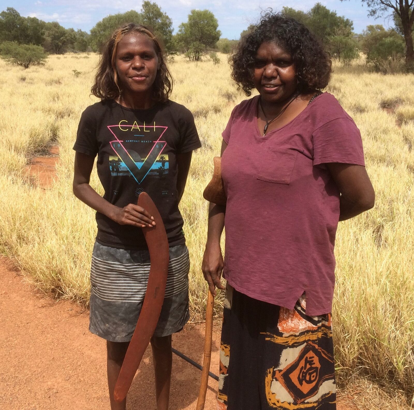 Anangu guide with visitors at Uluru
